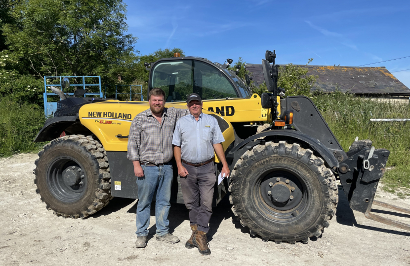 James with a local tractor dealer